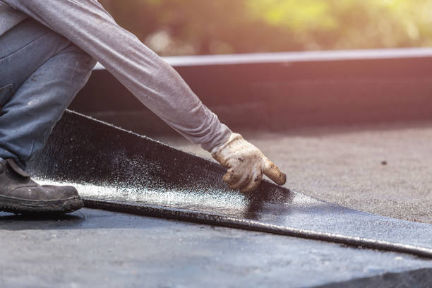 Professional Basement Waterproofing technician working in Amesville, OH